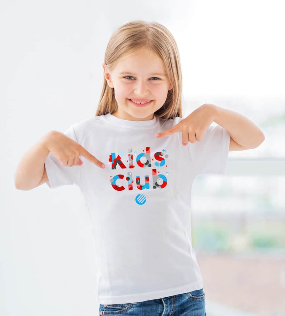 Young girl wearing a United Communications Kids Club shirt